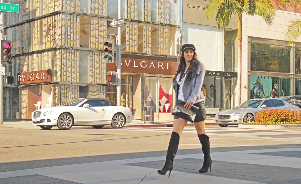 Laura Rodeo Drive 23,Guess black suede knee high boots, Rodeo Drive Beverly HIlls photo shoot,black faux leather skirt Guess, black newsboy cap hat with chain, Los angeles fashion blogger Laura Lily, three r photography, pretty woman outfit, Next UK grey suede jacket, - Pretty Woman Outfit by popular Los Angeles fashion blogger Laura Lily 