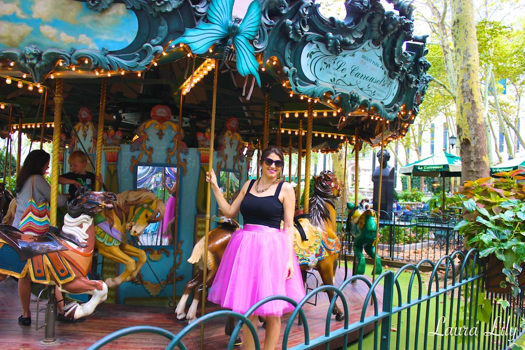 Bryant Park , Los Angeles Fashion Blogger Laura Lily, Bryant Park Carousel, Carrie Bradshaw style, Sex and the City tulle skirt, Space 46 Boutique Radiant orchid tulle skirt, purple prada cat eye sunglasses, floral Ivanka Trump Carra pumps, Carousel in Bryant Park, 
