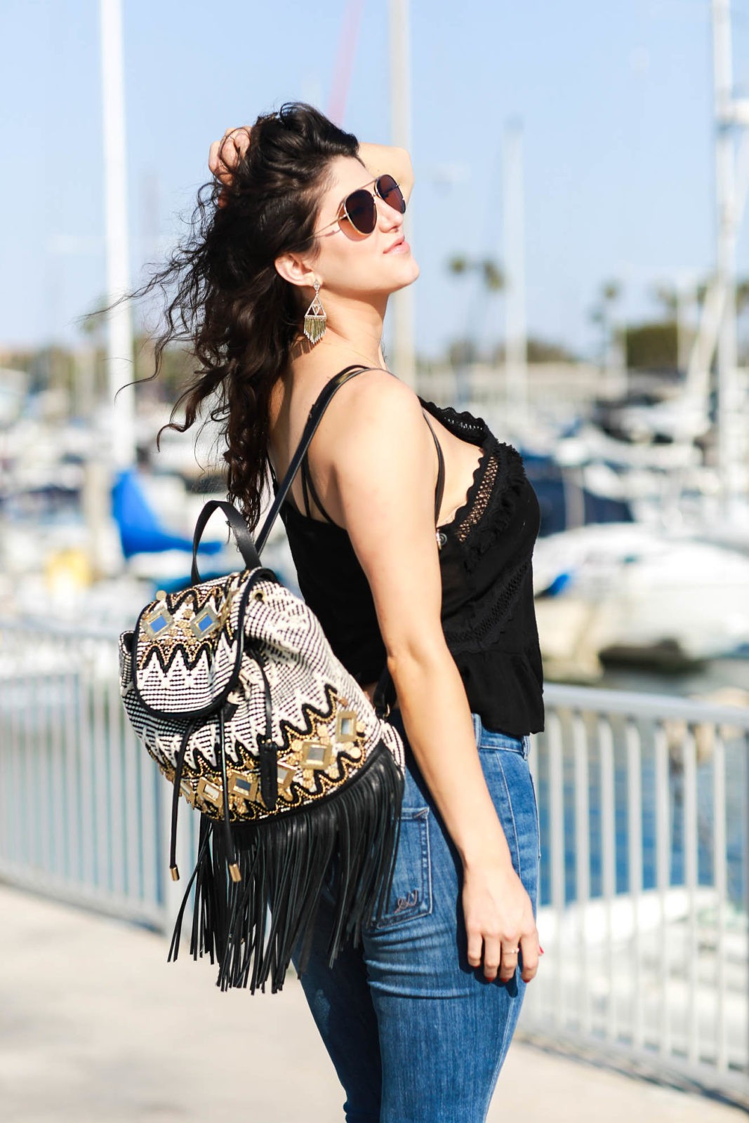 Rebecca Minkoff Fringe Backpack, Laura Lily - Fashion, Travel and Lifestyle Blog, Express Flare Jeans