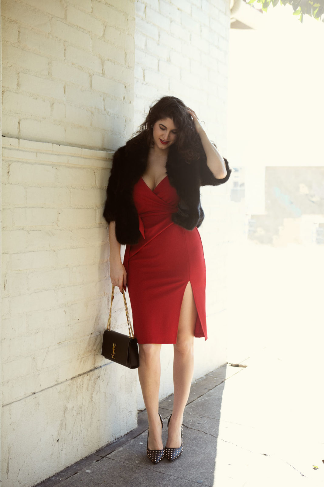Last Minute Gifts for Valentine's Day by Los Angeles Fashion Blogger Laura Lily, red asos dress | The Best Faux Fur Coats This Season by popular Los Angeles fashion blogger, Laura Lily: image of a woman wearing a faux fur coat. 