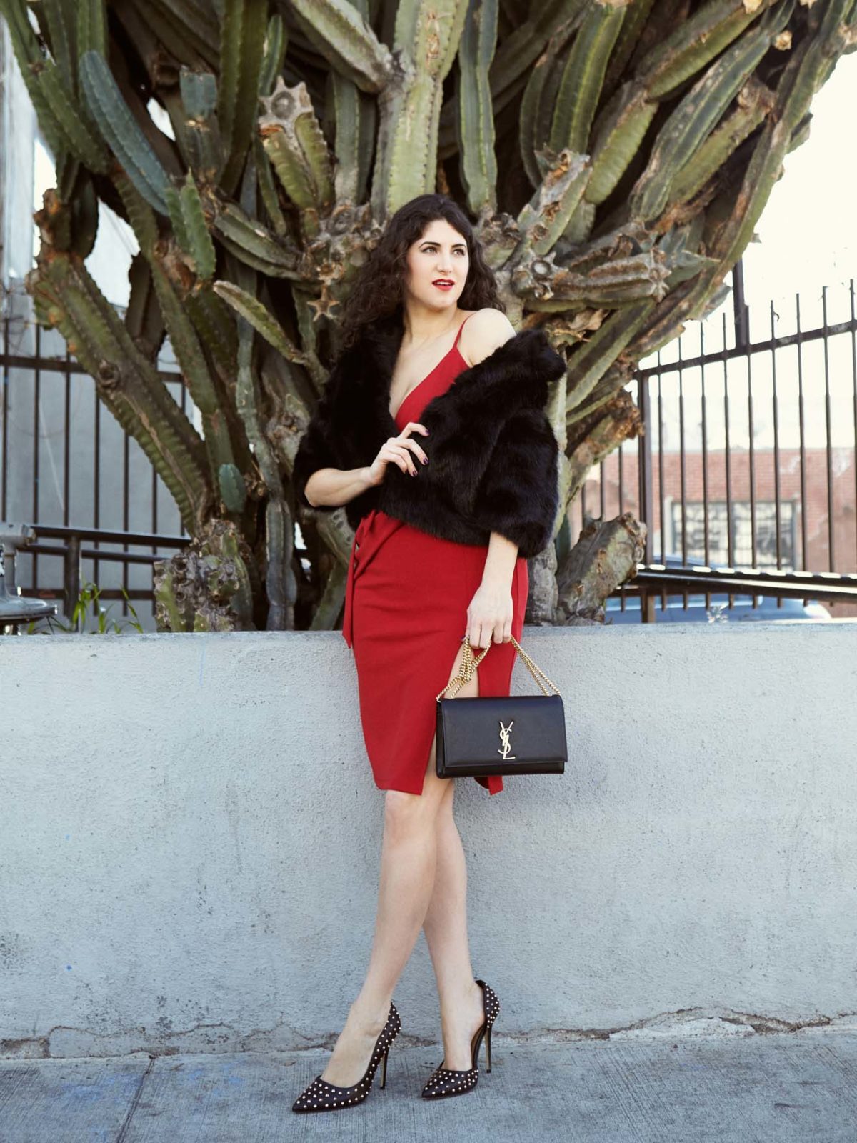 Last Minute Valentine's Day Gifts featured by top US life and style blogger, Laura Lily: image of a woman wearing a red asos dress, a Nordstrom caplet, Yves Saint Laurent bag,  and ShoeDazzle heels