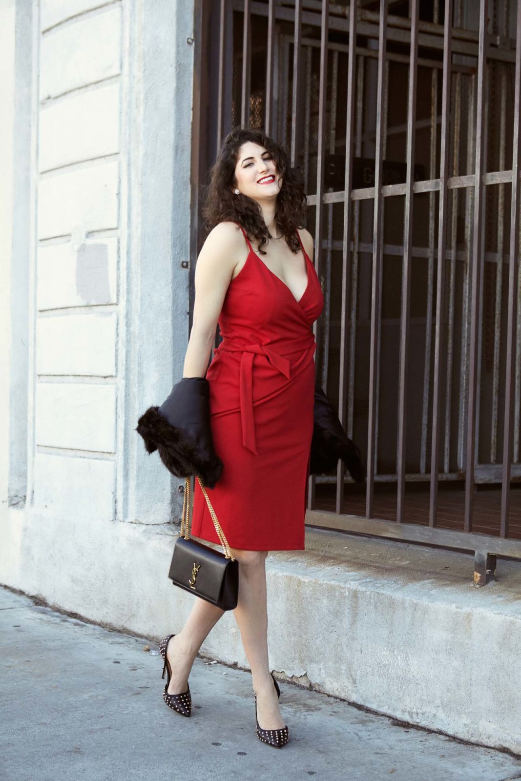 Last Minute Valentine's Day Gifts featured by top US life and style blogger, Laura Lily: image of a woman wearing a red asos dress, a Nordstrom caplet, Yves Saint Laurent bag,  and ShoeDazzle heels