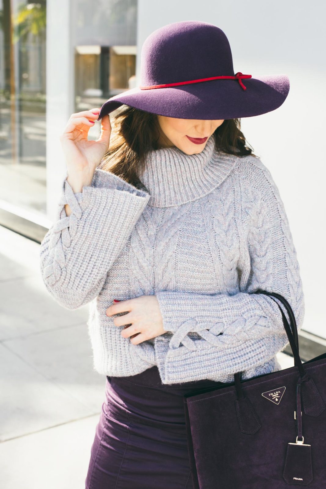 Cute winter looks and Bell Sleeve Sweaters by top Los Angeles Fashion Blogger Laura Lily, Purple suede prada bag