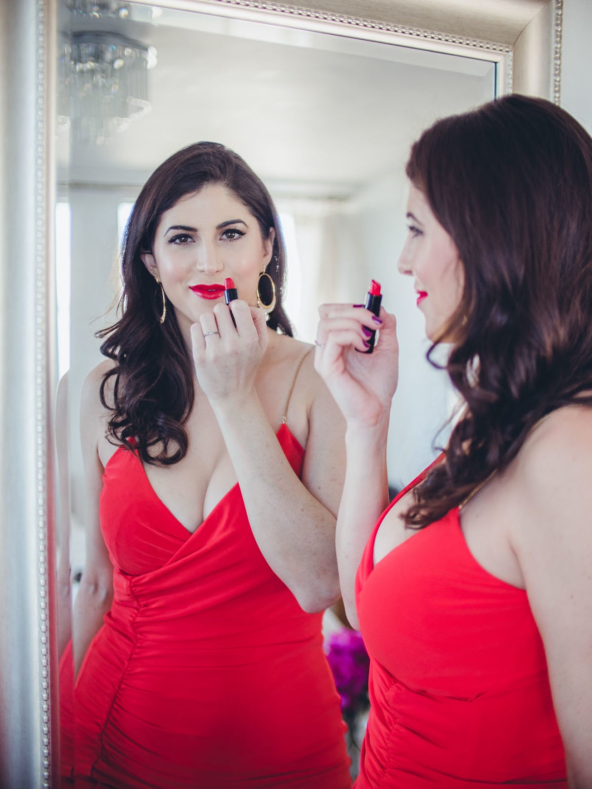 Valentine's Day Outfit featured by top US fashion and beauty blogger Laura Lily: image of a woman wearing an Eliza J red dress, Yves Saint Laurent bag, Stuart Weitzman heels, Chichouz bathrobe, Gorjana earrings, Simone Perele lingerie