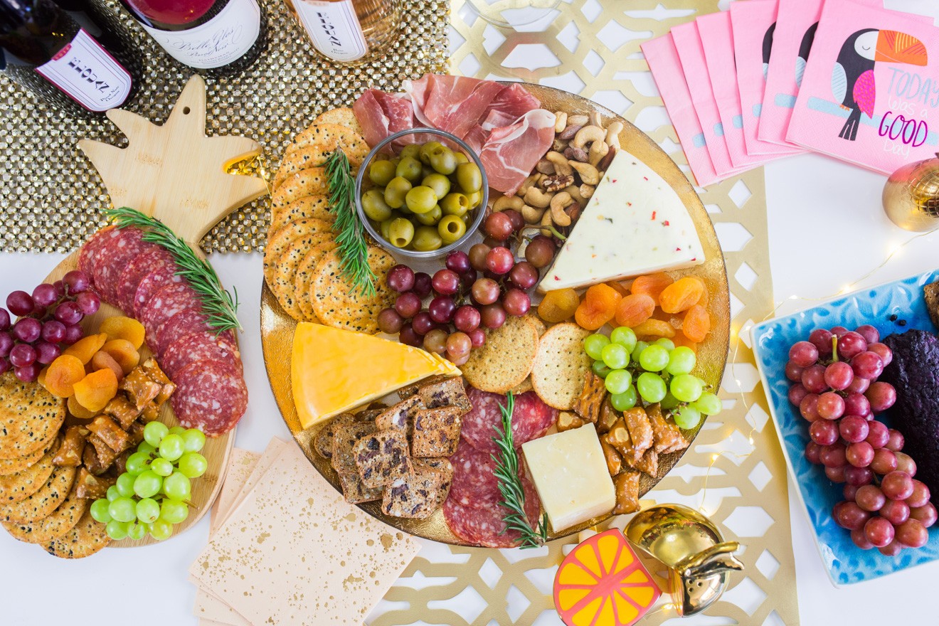 How to Make a Cheese Board in Under 10 Minutes, tips featured by top US lifestyle blogger, Laura Lily | Dinner Party Essentials: Hosting Tips, Table Settings Ideas and Bar Cart Inspiration by popular Los Angeles life and style blogger, Laura Lily: image of some charcuterie boards.