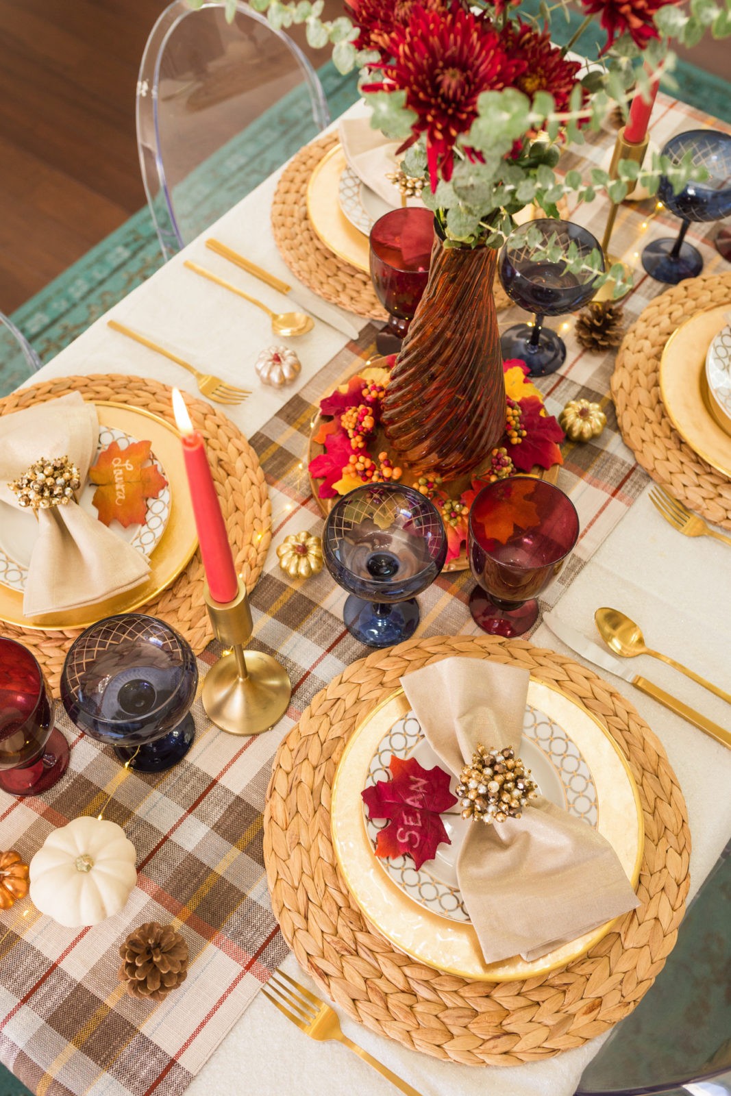 Easy Thanksgiving Table Setting Ideas by Popular Lifestyle Blogger Laura Lily, Thanksgiving Tablescape Ideas, Target Fall Home decor : Thanksgiving table setting with accents of orange, blue and red