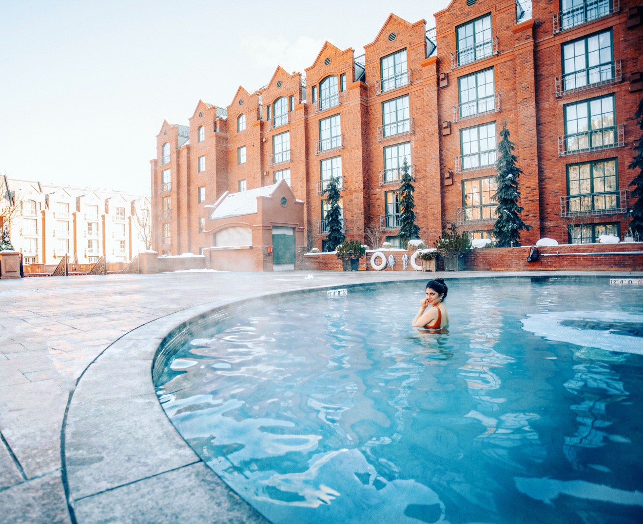 The Best St. Regis Aspen Travel Guide by featured by top Los Angeles Travel Blogger, Laura Lily : image of the Midnight Supper at the St Regis Aspen: image of the St Regis Aspen heated pool