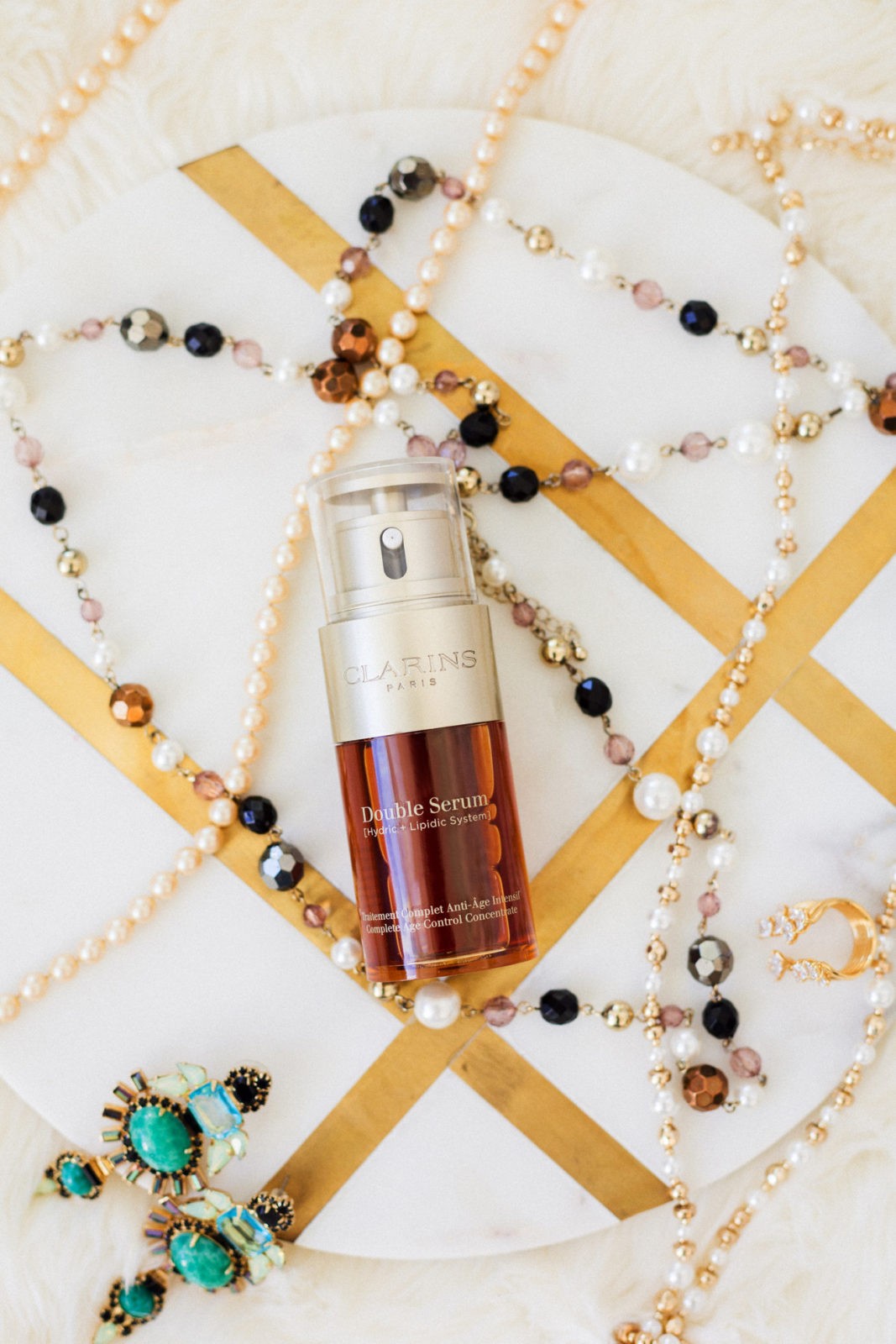 Clarins Double Serum featured by top US fashion blogger Laura Lily