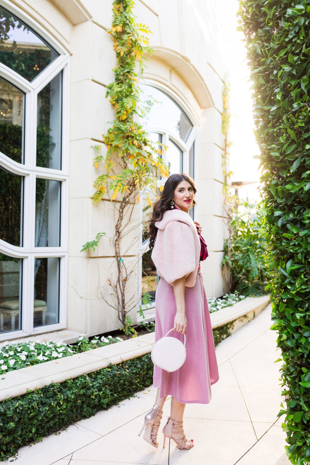 Pink Velvet Wrap Skirt by Fashion Blogger Laura Lily, Peninsula Beverly Hills Hotel | Cute Valentine's Day Dresses from Asos by popular Los Angeles fashion blogger, Laura Lily: image of a woman wearing a Asos pink velvet wrap skirt. 