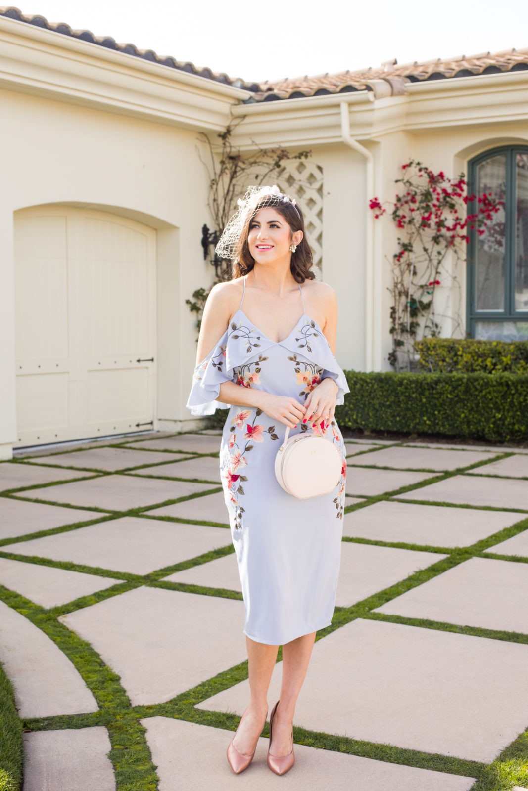 Spring Wedding Guest Dress, woman in baby blue embroidered dress, Top US fashion blogger Laura Lily, baby pink veil,