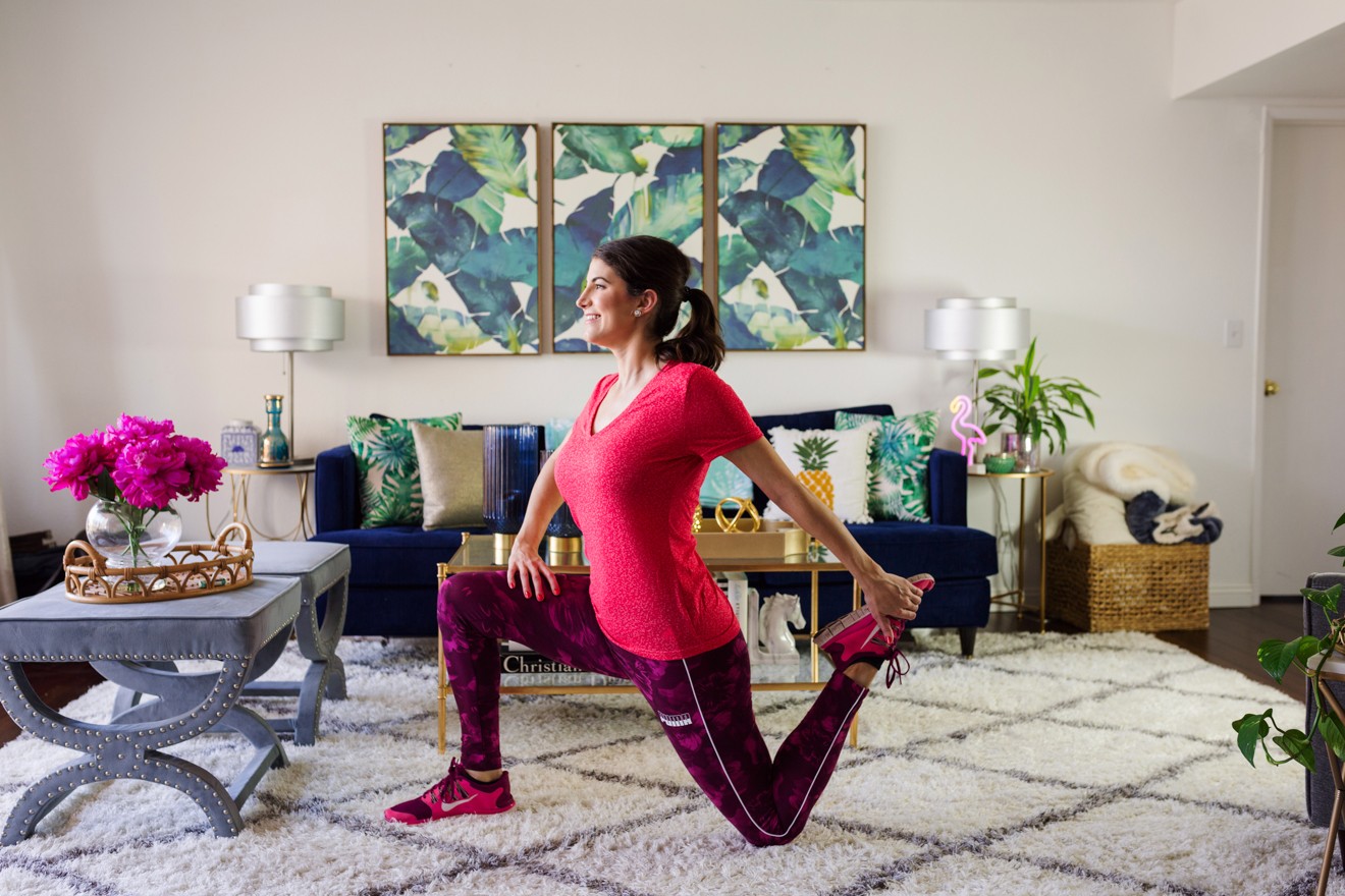 Simple steps to a healthier lifestyle featured by top US lifestyle blogger, Laura Lily: image of a woman bring a Mike vintage skirt, Puma floral leggings, Adidas top and Nike zip up hoodie