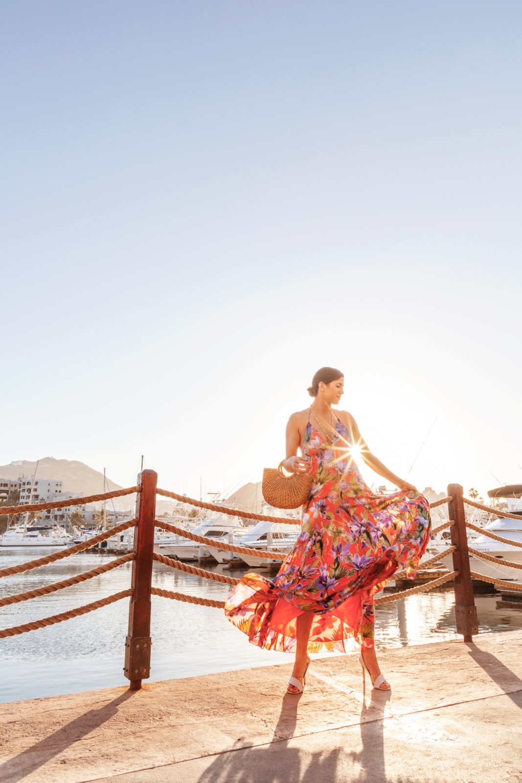 Hacienda Encantada Resort featured by top US travel blogger Laura Lily; Image of a woman wearing a floral dress.