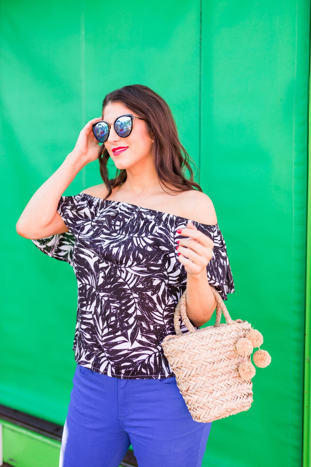Summer Fashion Trends featured by top US fashion blogger Laura Lily; Image of a woman wearing off the shoulder ruffle top from Walmart.