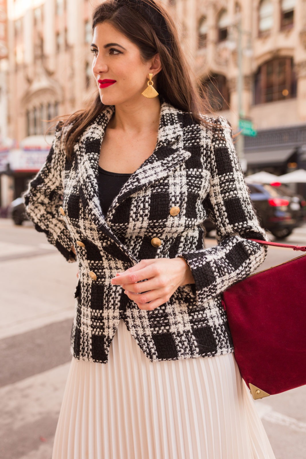The Best Fall Work Blazers for Women featured by top US fashion blogger, Laura Lily: image of a woman wearing a L’Agence tweed blazer.