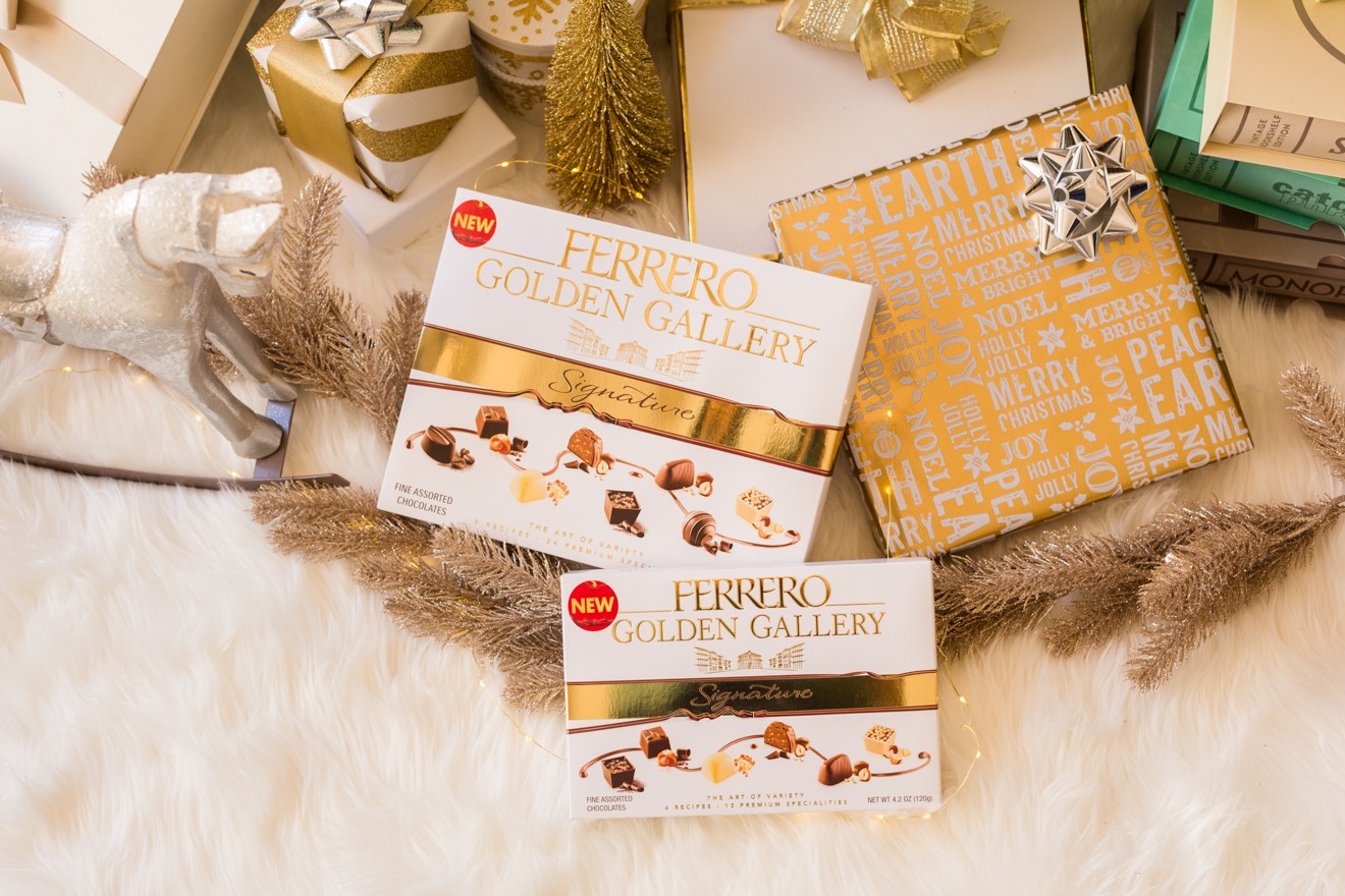 The Perfect Gift for Everyone, Ferrero Golden Gallery Signature Chocolates by Lifestyle Blogger Laura Lily | Ferrero Golden Gallery: The Perfect Holiday Gift for Everyone by popular Los Angeles life and style blogger, Laura Lily: image of wrapped presents and a couple boxes of Ferrero Golden Gallery chocolates under a Christmas tree.