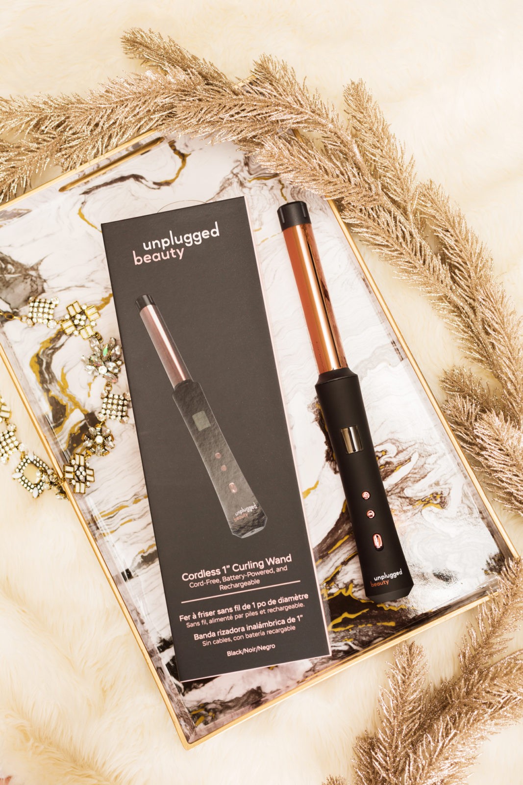 Gift Ideas for the Woman Who Has Everything by Lifestyle Blogger Laura Lily, Unplugged Beauty Cordless Curling Want, Luxurious Gift Ideas for Her |  Gift Ideas for the Woman Who Has Everything by popular Los Angeles life and style blogger, Laura Lily: image of a Unplugged Beauty cordless curling wand.