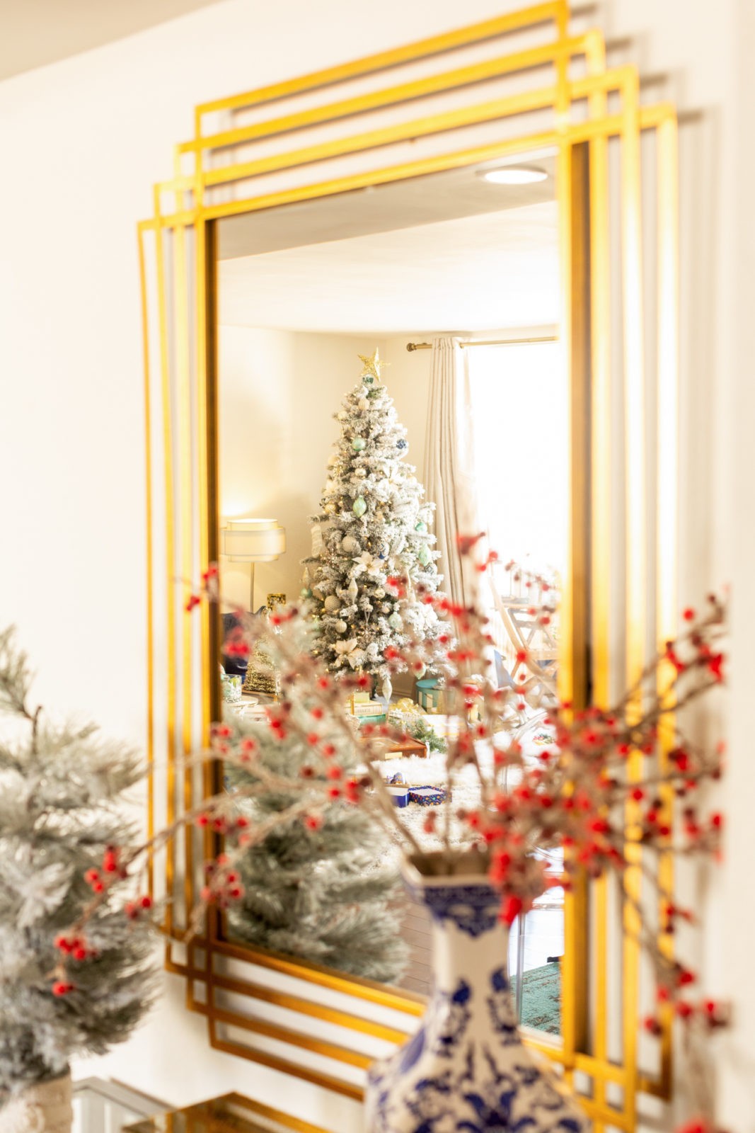 Holiday Home Decor by Home Decor Blogger Laura Lily, Christmas Decorating Ideas | Holiday Home Decor 2019 by popular Los Angeles life and style blogger, Laura Lily: image of a flocked Christmas tree.