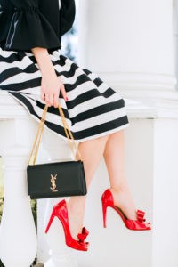 The Ultimate Holiday Outfit Guide by Fashion Blogger Laura Lily, red Valentino bow heels,