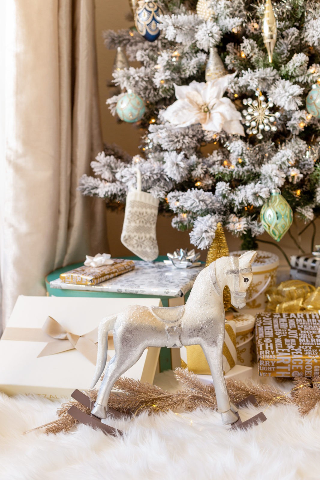 Holiday Home Decor by Home Decor Blogger Laura Lily, Christmas Decorating Ideas | Holiday Home Decor 2019 by popular Los Angeles life and style blogger, Laura Lily: image of a Michael's Crafts rocking horse. 